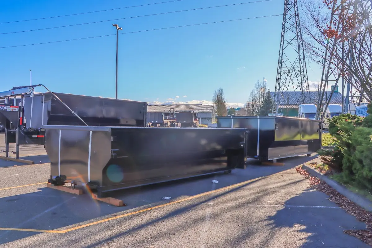 Roll-off dumpster ready for waste disposal at job site for Concrete Dumpster Rental in Thetford